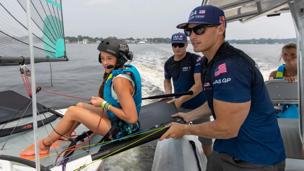 Jimmy Spithill and Sail GP Team teaching kids how to foil on the Skeeta