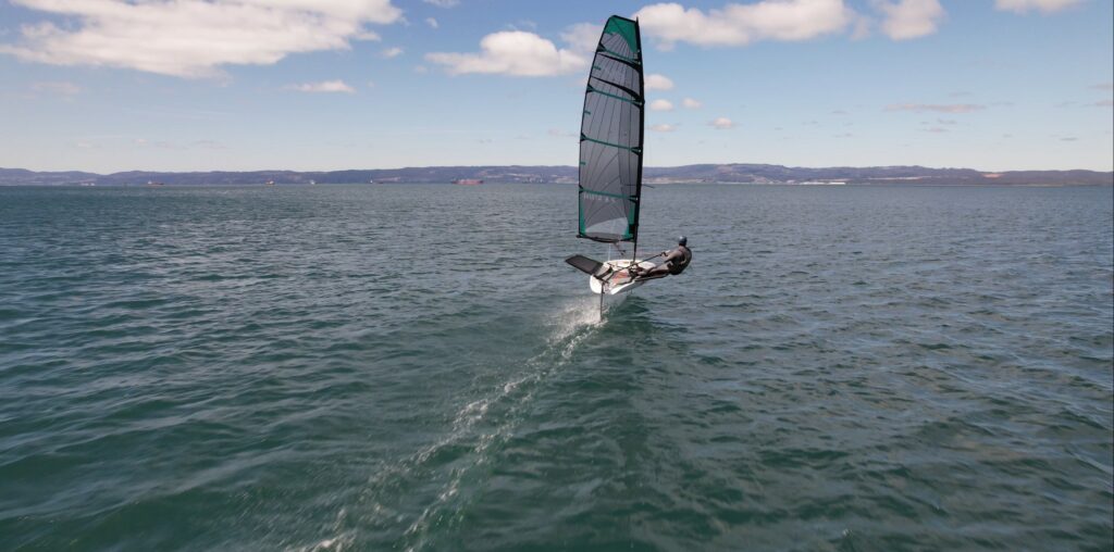 amazing drone shot demonstrating this beautiful new foiling sailing boat